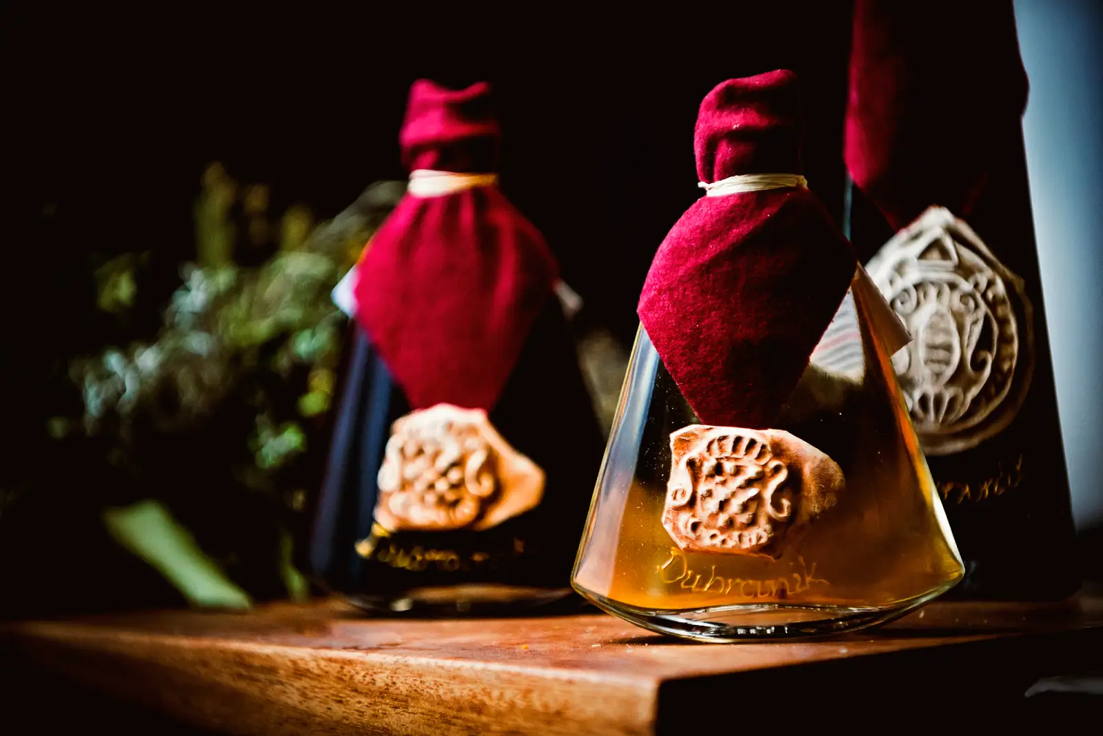 Traditional rose liqueur Rozolin in glass bottle – handmade Dubrovnik specialty from Terra Croatica souvenir shop.